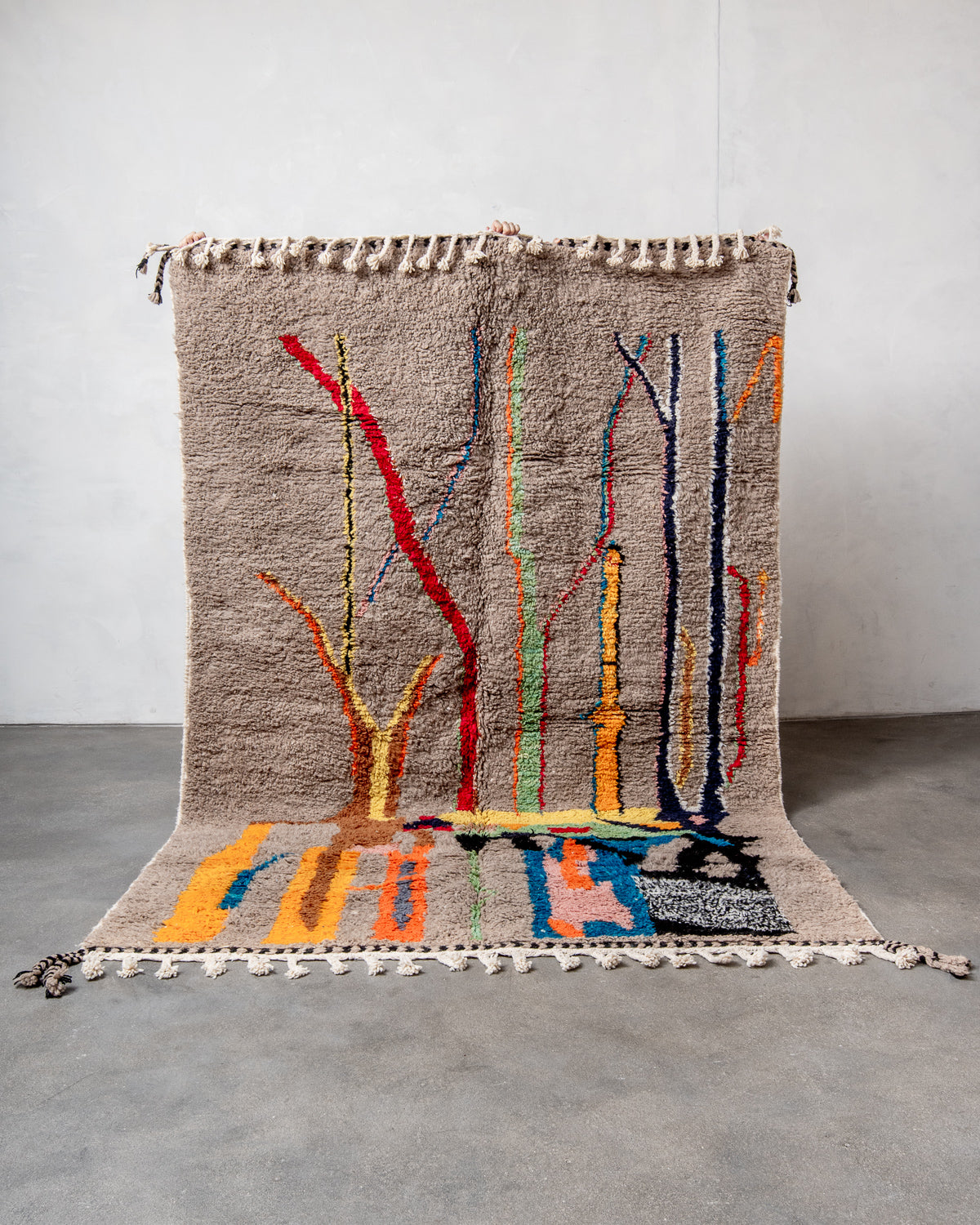 Modern, designer, handcrafted Berber rug from Morocco. Beniourain carpet with beautiful colours and patterns and fluffy wool texture.